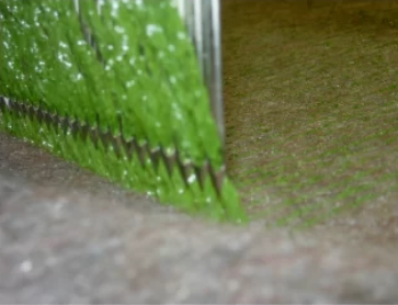 A close-up image of tufted sports surfaces 