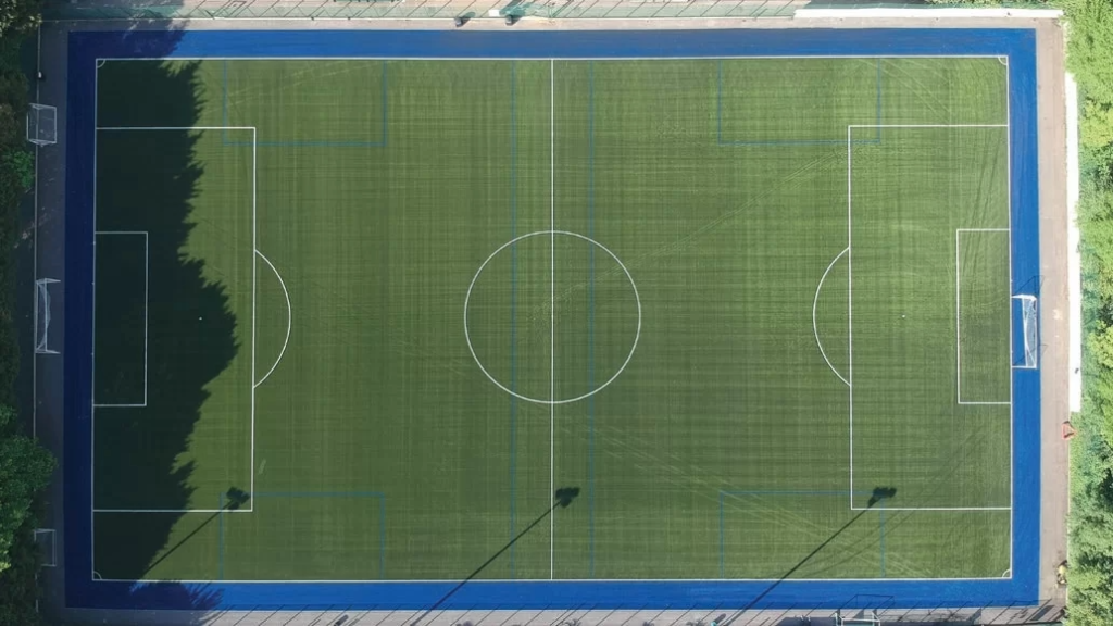 Aerial view of a 3G football pitch with a blue border